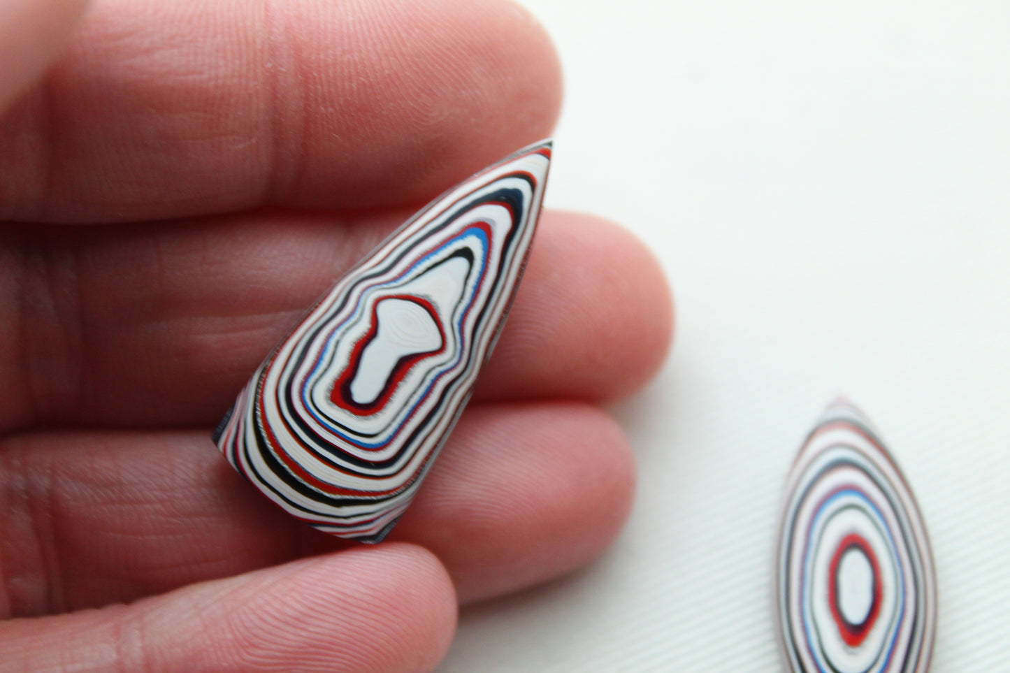 TWO Fordite Cabochon white red blue