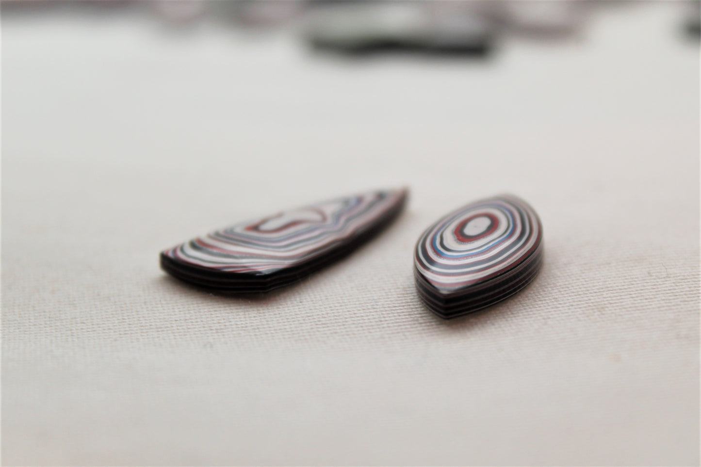 TWO Fordite Cabochon white red blue