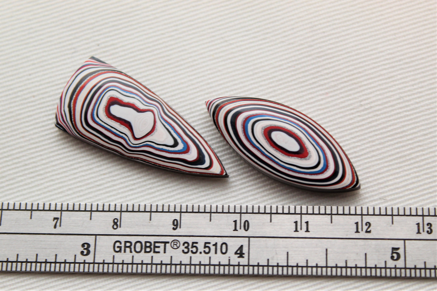 TWO Fordite Cabochon white red blue