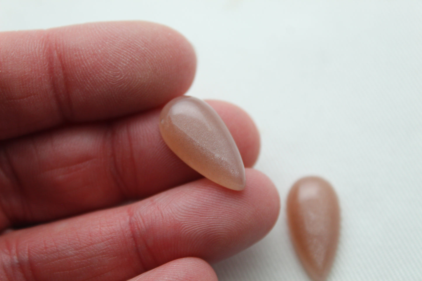 TWO peach Moonstone cabochons 10X20MM Gemstones pear