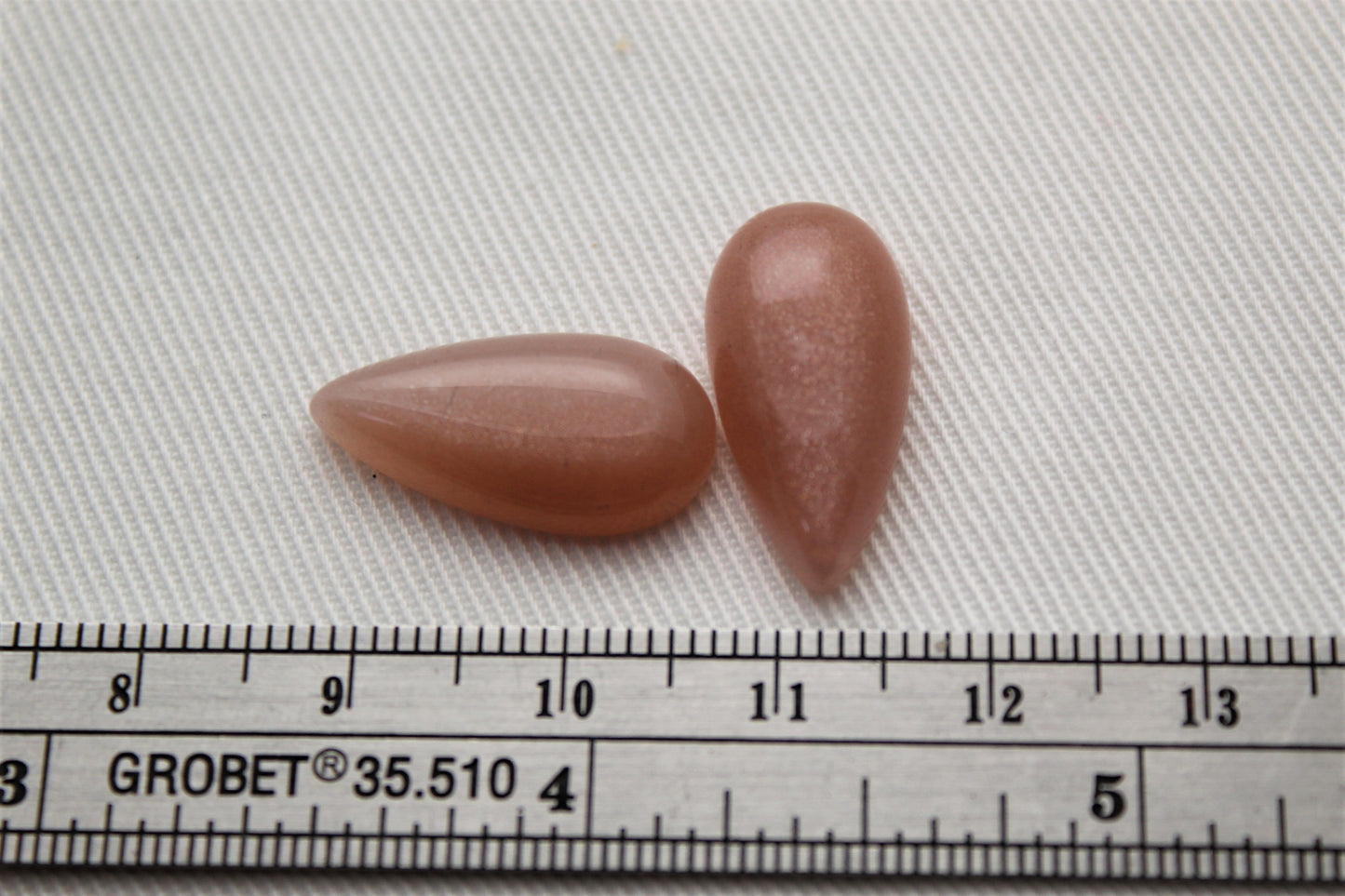 TWO peach Moonstone cabochons 10X20MM Gemstones pear