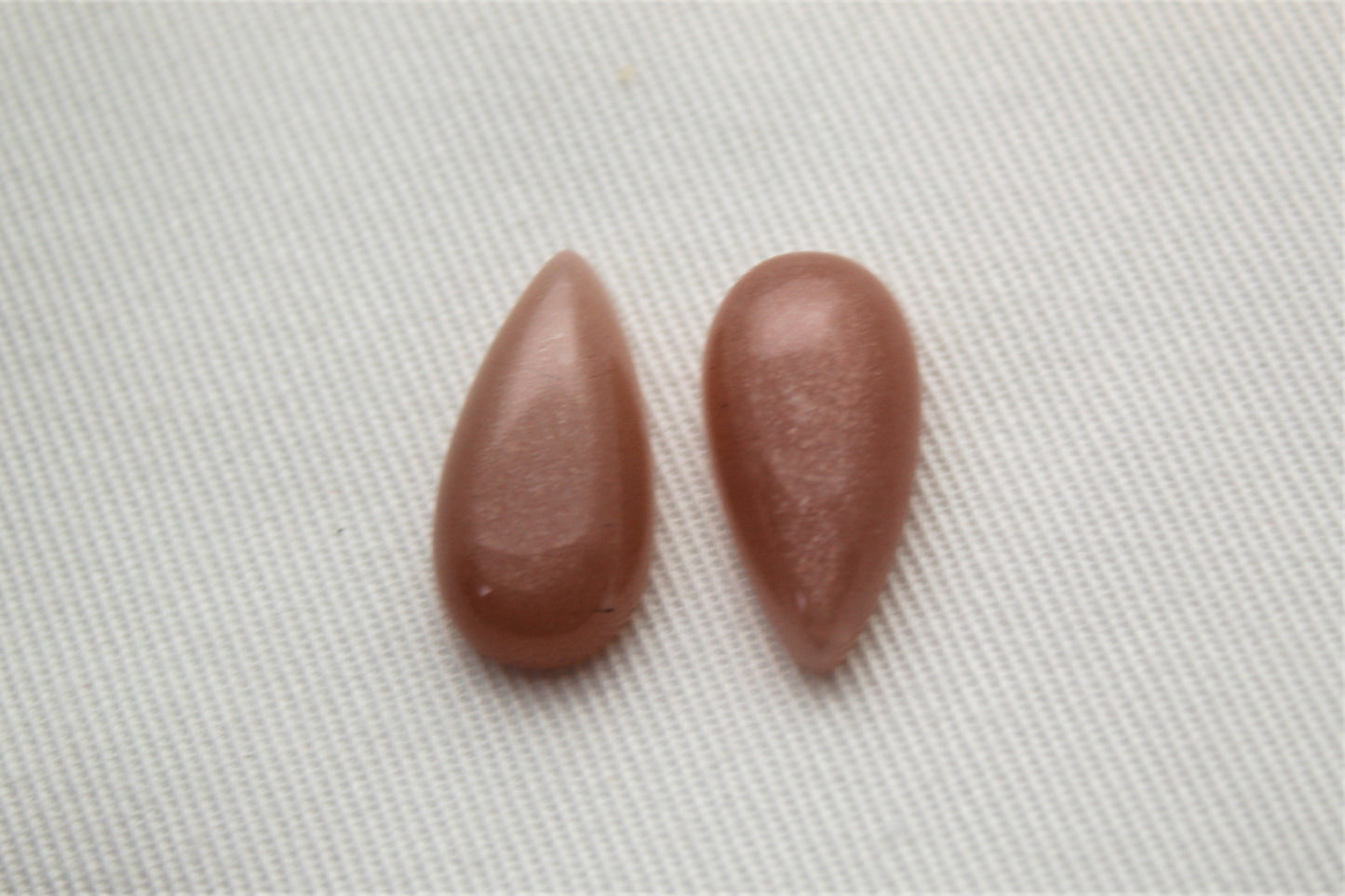 TWO peach Moonstone cabochons 10X20MM Gemstones pear