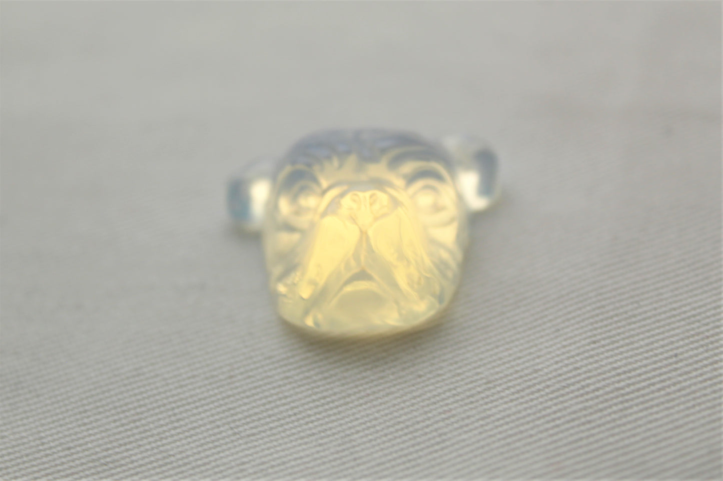 Opalite Cabochon in a Bulldog shape carved