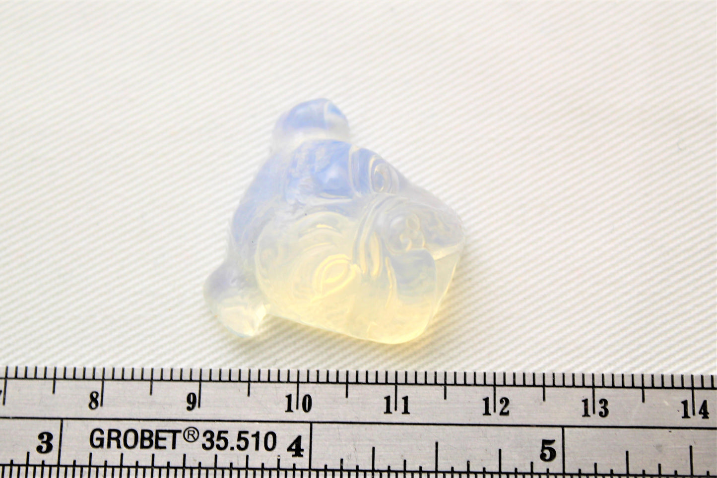 Opalite Cabochon in a Bulldog shape carved