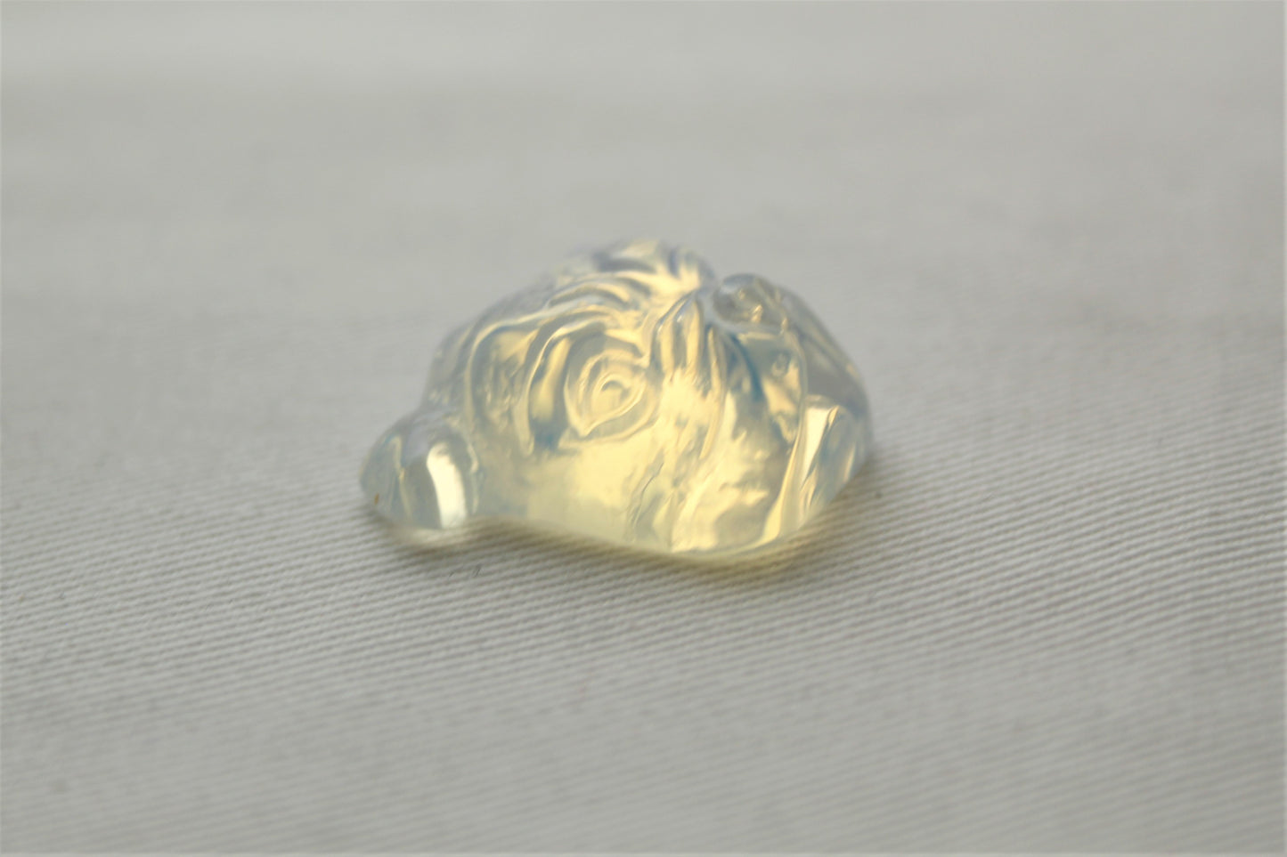 Opalite Cabochon in a Bulldog shape carved
