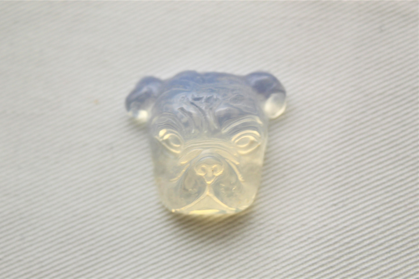 Opalite Cabochon in a Bulldog shape carved