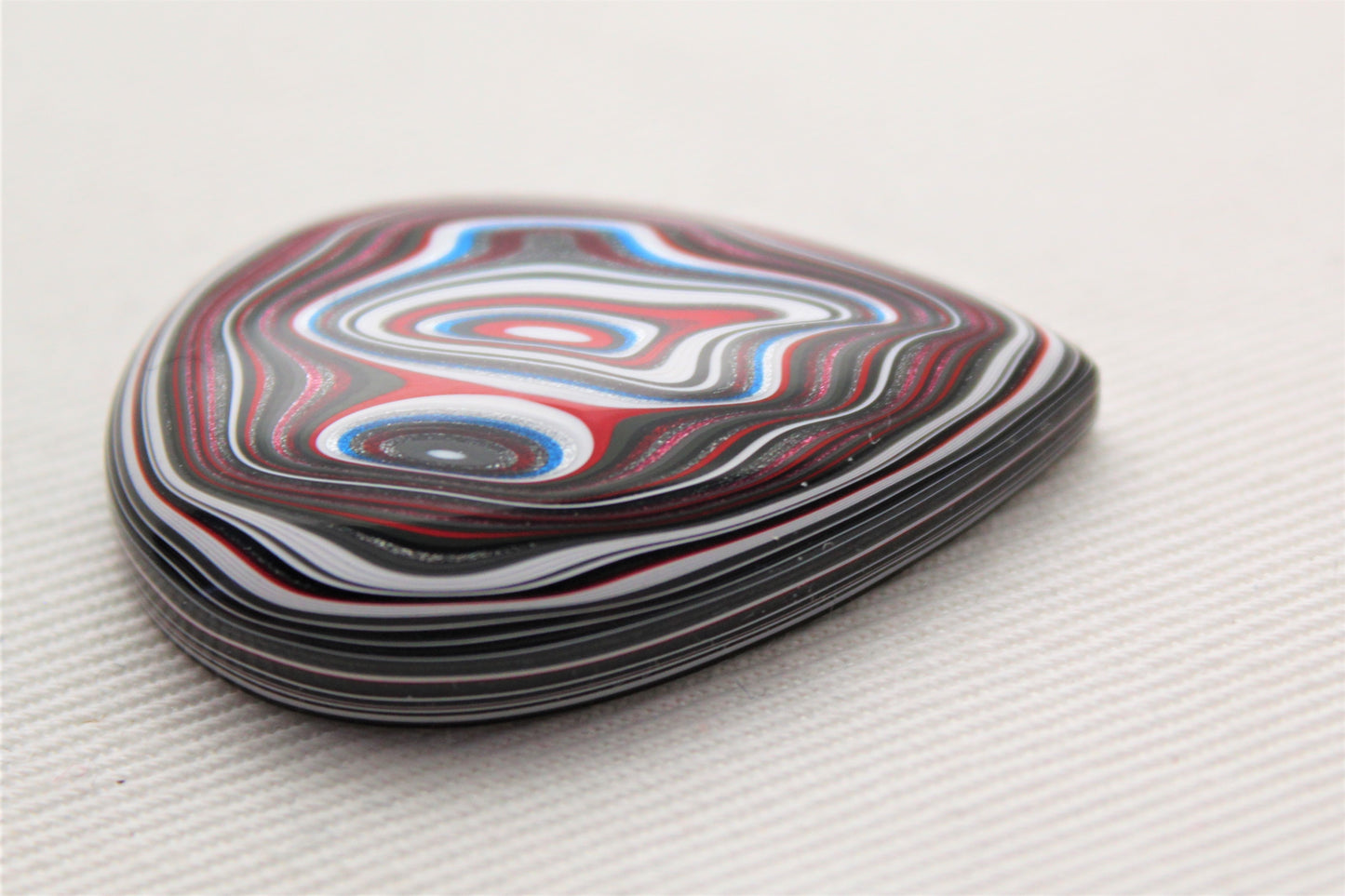 Fordite Cabochon teardrop blue black red