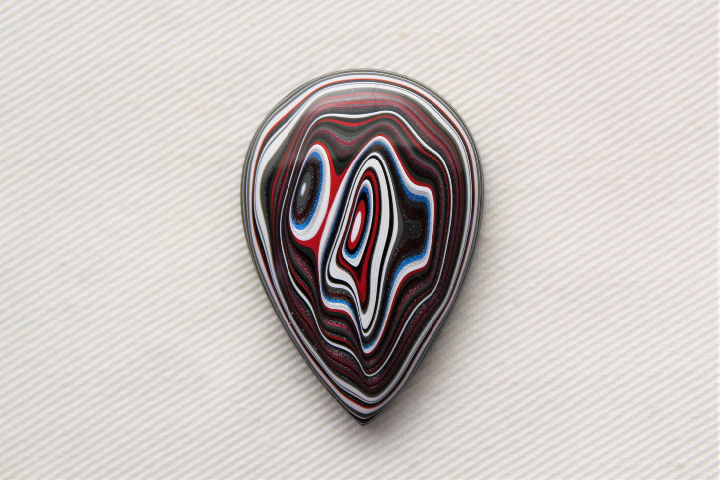 Fordite Cabochon teardrop blue black red