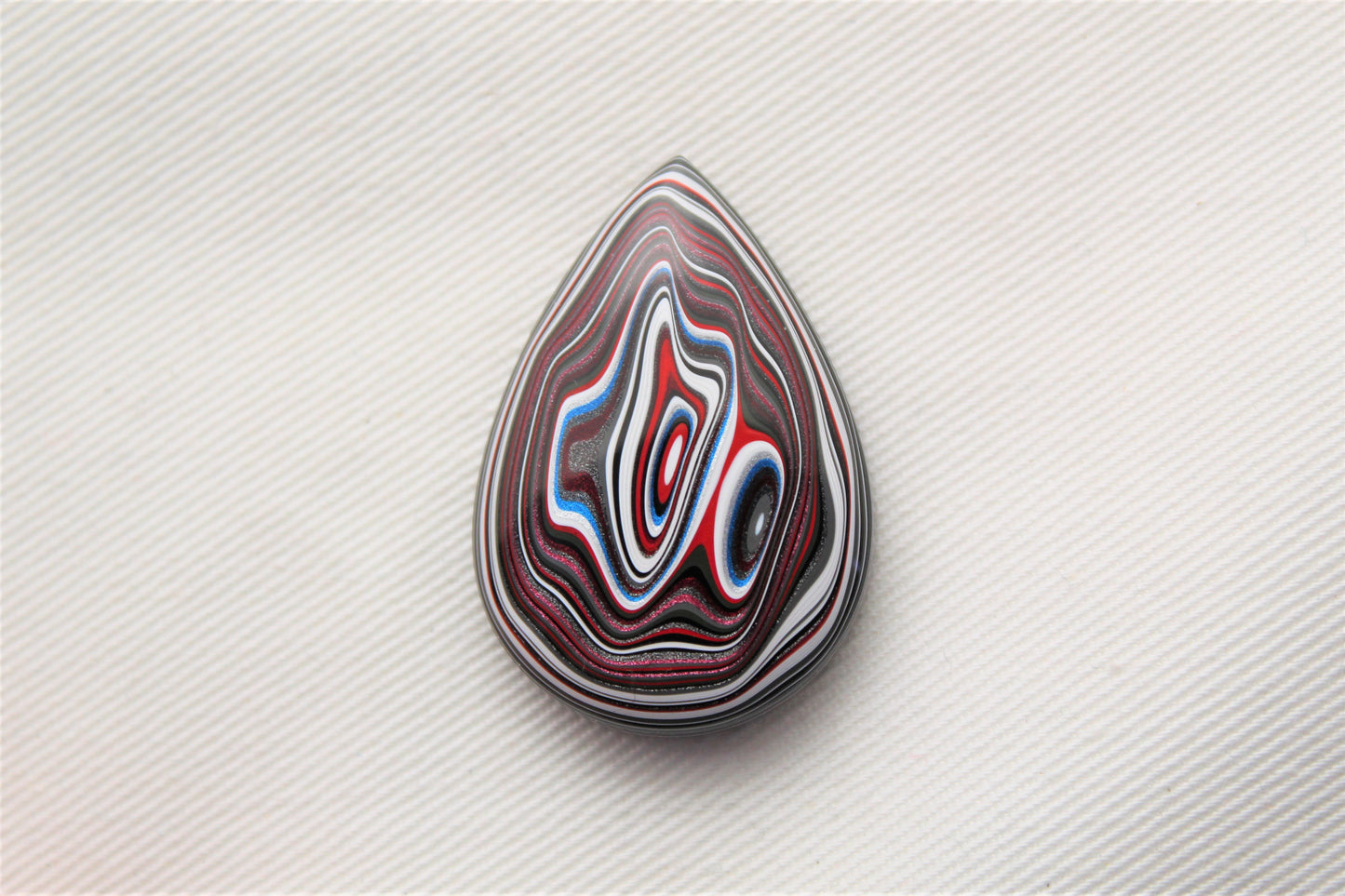 Fordite Cabochon teardrop blue black red