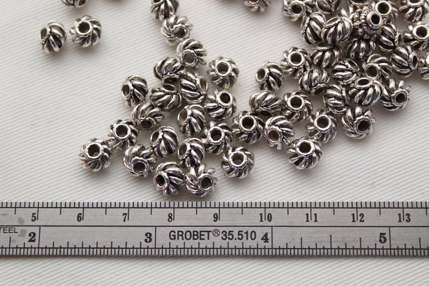 Lot de 100 Perles Rondelles Métal 8MM