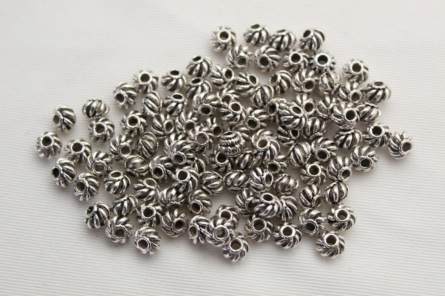 Lot de 100 Perles Rondelles Métal 8MM