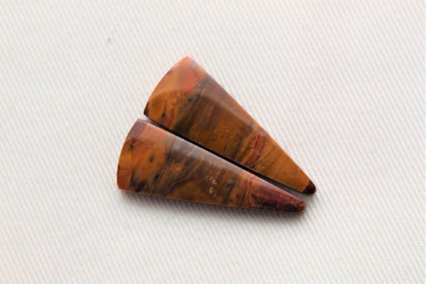 Pair of Opalized Copper Wood Cabochons