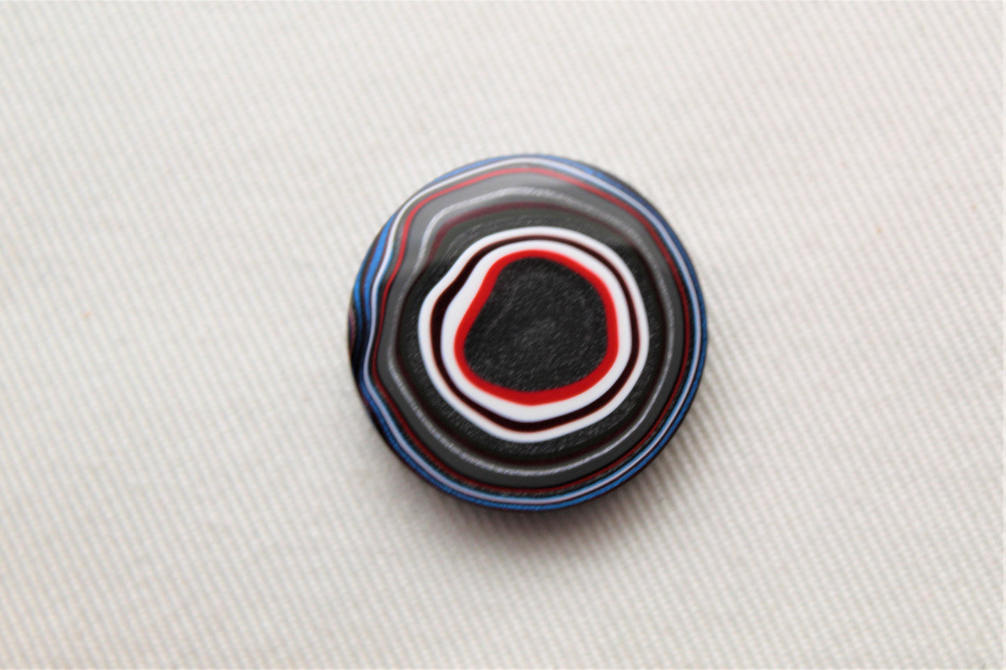 Fordite Cabochon round white red black 25MM