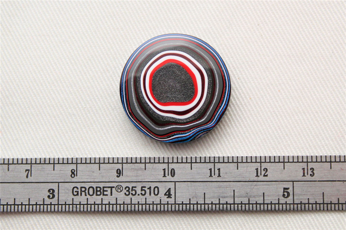 Fordite Cabochon round white red black 25MM