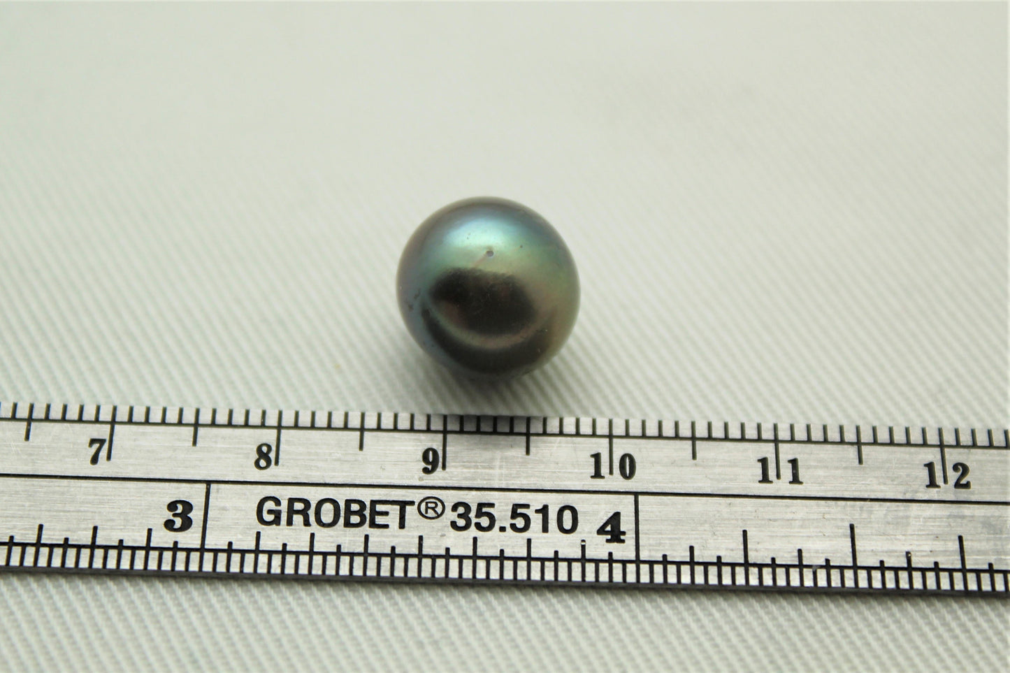 One Semi round Tahitian Pearl 11MM UNDRILLED